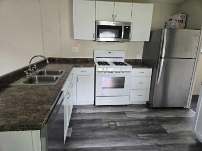 Photo 2 of 7 of home located at 3906 Peach Blossom Ln. #212 Midland, MI 48642