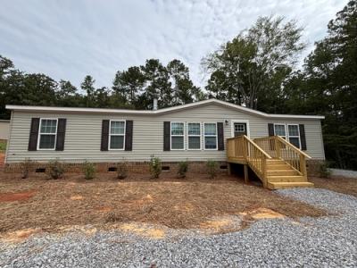 Photo 2 of 22 of home located at 457 Davis St. Wilsonville, AL 35186