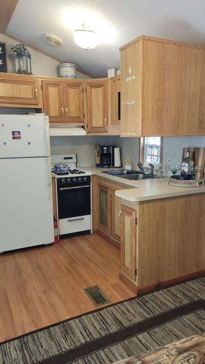 Photo 3 of 8 of home located at 261 Point Sebago Road, Lot S0360 Casco, ME 04015