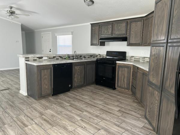 Photo 1 of 2 of home located at 1908 E 19th St. Lot E-38 Lot E038 Lawrence, KS 66046