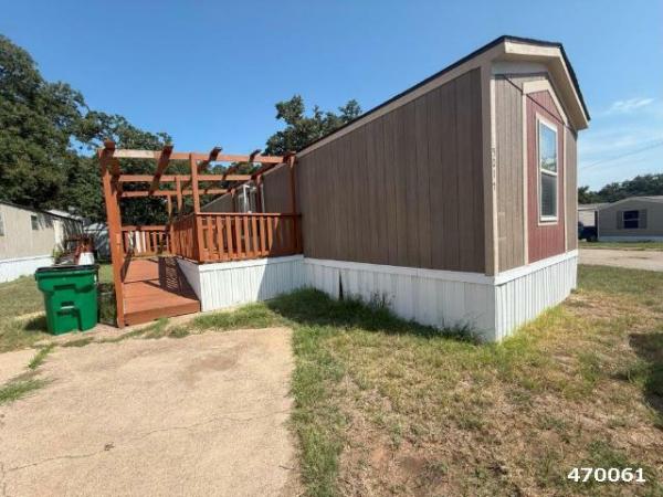 Photo 1 of 2 of home located at Redwood Estates *See Funding A 5017 Apache Ct Fort Worth, TX 76119