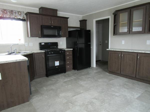 Photo 1 of 2 of home located at 589 Saturn Dr., Site 229 Midland, MI 48642