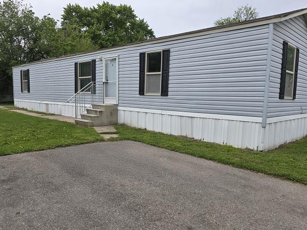 Photo 1 of 2 of home located at 1001 E Macarthur Rd, Lot 80 Wichita, KS 67216