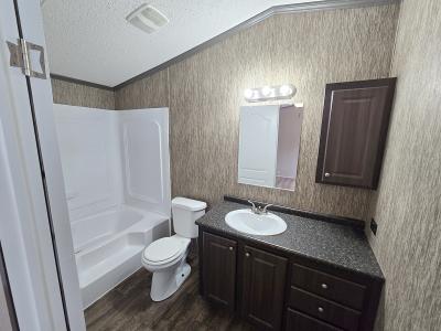 Photo 5 of 7 of home located at 1001 E Macarthur Rd, Lot 76 Wichita, KS 67216