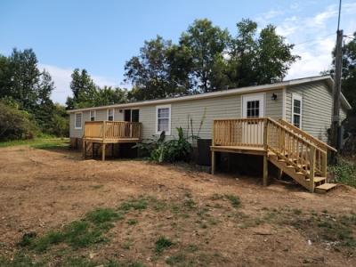 Photo 2 of 17 of home located at 900 County Road 441 Hillsboro, AL 35643