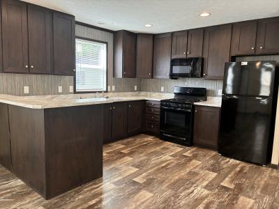 Photo 4 of 11 of home located at 2327 S Dundee Ct Highland, MI 48357