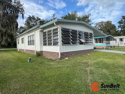 Photo 2 of 51 of home located at 2219 NW 47th Circle Lot 201 Ocala, FL 34482