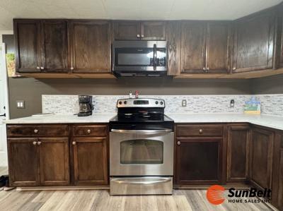 Photo 3 of 47 of home located at 2219 NW 47th Circle Lot 201 Ocala, FL 34482