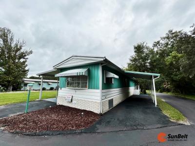 Photo 3 of 28 of home located at 2828 NE 49th Avenue Lot 85 Ocala, FL 34470
