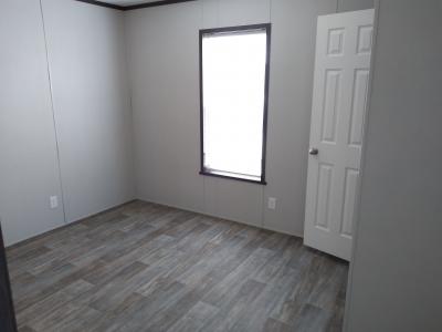 Photo 4 of 5 of home located at 8 E Grant Ct Highland, MI 48357