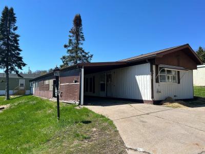 Photo 2 of 9 of home located at 1300 Michigan Avenue, Site # 64 Iron Mountain, MI 49801