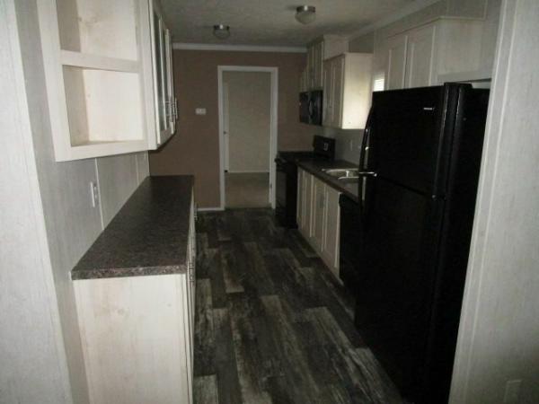 Photo 1 of 2 of home located at 1203 NW 57th Street Lot 7S1203 Kansas City, MO 64118