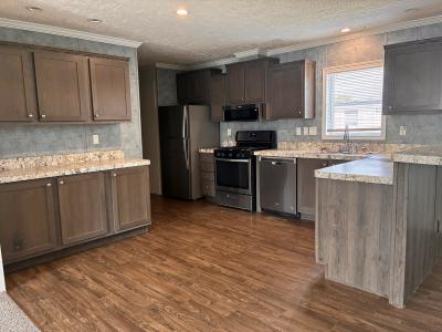 Photo 4 of 9 of home located at 2730 E Murray Ct Highland, MI 48357