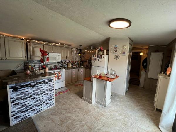 Photo 1 of 2 of home located at 21341 Chalet Dr., Site #128 Macomb, MI 48044