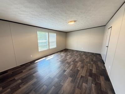 Photo 5 of 12 of home located at 1656 County Road 3479A Cleveland, TX 77327