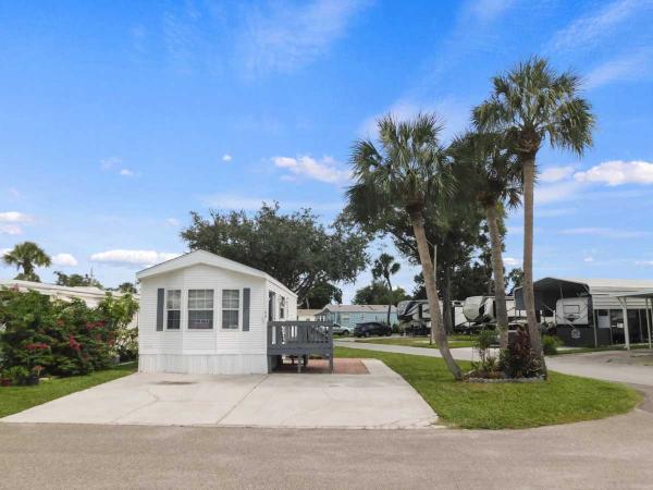 Photo 1 of 2 of home located at 21632 State Road 54 Lot 66 Lutz, FL 33549