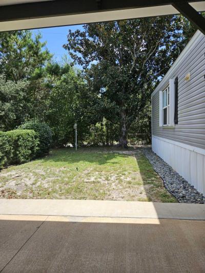 Photo 3 of 23 of home located at 9879 Buttercup Circle Navarre, FL 32566