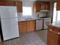 1997 MH  Home