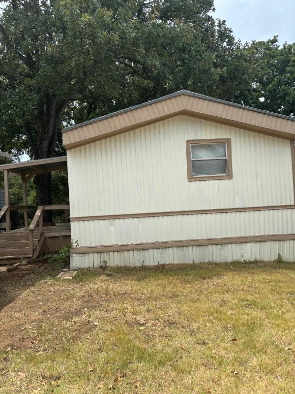 Photo 1 of 2 of home located at 9100 Teasley Lane, #24K Lot K24 Denton, TX 76210