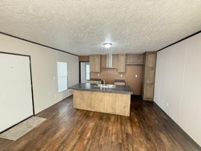 Photo 4 of 16 of home located at 412 Avenue E Stowell, TX 77661