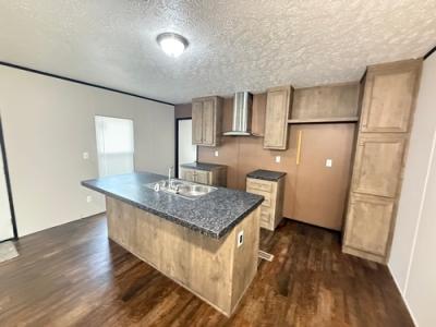 Photo 5 of 16 of home located at 412 Avenue E Stowell, TX 77661