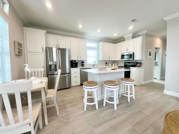 Photo 1 of 2 of home located at 411 NE Pier Way Jensen Beach, FL 34957