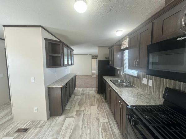 Photo 4 of 2 of home located at 45606 Sheri Drive, Site #216 Macomb, MI 48044