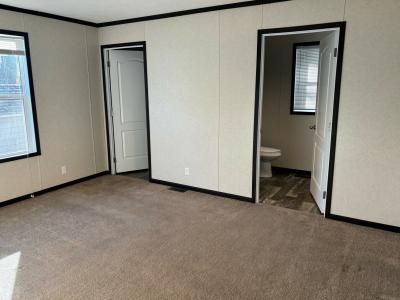 Photo 4 of 5 of home located at 9830 Ivan Drive Site #012 Ypsilanti, MI 48197