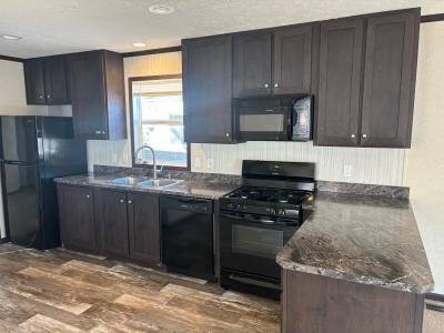 Photo 3 of 6 of home located at 9834 Ivan Drive Site #011 Ypsilanti, MI 48197