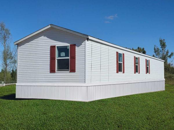 Photo 1 of 1 of home located at 8735 Entrance Drive Lot 143 Alanson, MI 49706