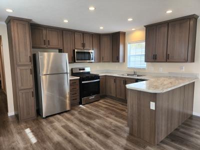 Photo 2 of 7 of home located at 14437 Berkshire Dr. North Shelby Township, MI 48315