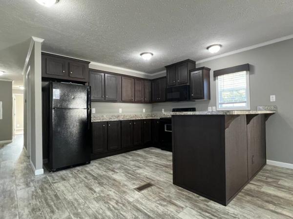 Photo 1 of 2 of home located at 126 E Sourwood Drive Brown Summit, NC 27214