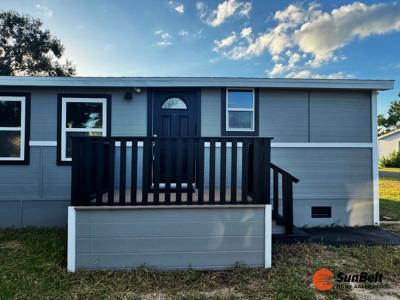 Photo 2 of 59 of home located at 3920 SW 30th Street Lot C47 Ocala, FL 34472