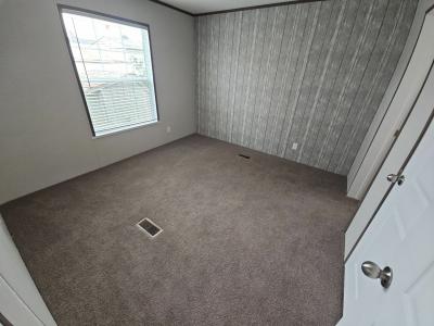 Photo 5 of 9 of home located at 2411 Hawaii Drive, Site # 29 Janesville, WI 53548