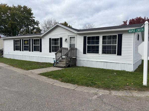 Photo 1 of 2 of home located at 8581 Troy St. SW Byron Center, MI 49315