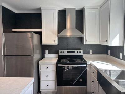 Photo 4 of 18 of home located at 1410 Jack Calhoun Dr., Site 18 Kissimmee, FL 34741