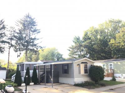 Photo 1 of 5 of home located at 5721 Pinebrook Ave. SE Kentwood, MI 49548