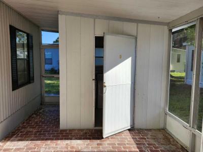 Photo 2 of 15 of home located at 7111 142nd Ave Lot #104 Largo, FL 33771