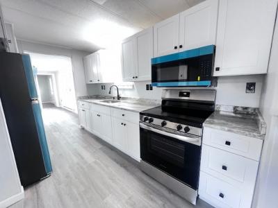 Photo 4 of 14 of home located at 13 Windsor Drive Westbrook, ME 04092