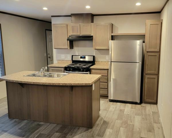 Photo 1 of 2 of home located at 9056 Four Winds Lane East Lot 302 West Olive, MI 49460