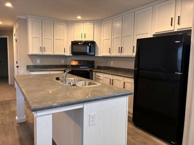 Photo 4 of 11 of home located at 2395 Douglas Dr Highland, MI 48357