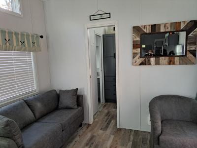 Photo 3 of 11 of home located at 261 Point Sebago Road, Lot S0343 Casco, ME 04015