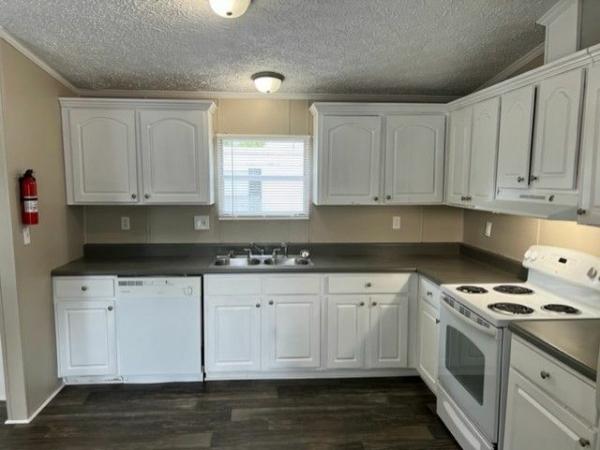 Photo 1 of 2 of home located at 724 Creek Ridge Road #220 Greensboro, NC 27406