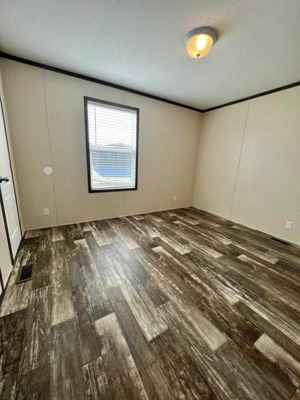 Photo 1 of 2 of home located at 6580 North Hampshire Drive Lot 304 Holly, MI 48442