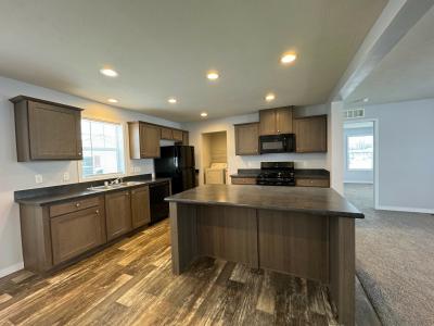 Photo 2 of 7 of home located at 3355 Creekside Blvd Burton, MI 48519