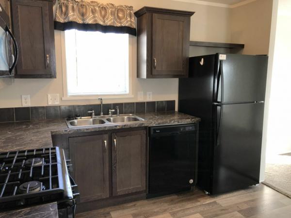 Photo 1 of 2 of home located at 258 Rockford Circle White Lake, MI 48386