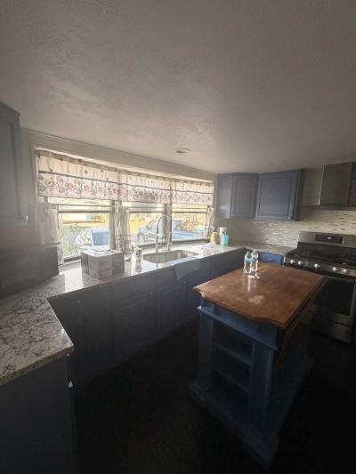 Photo 4 of 8 of home located at 3060 E. Bridge St, #109 Brighton, CO 80601