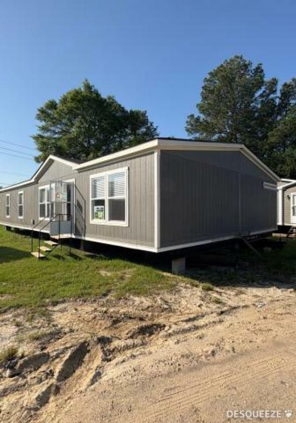 Photo 1 of 2 of home located at Clearance Homes Of Texas 18224 Us Highway 59 New Caney, TX 77357