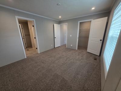 Photo 5 of 7 of home located at 2375 Douglas Dr Highland, MI 48357