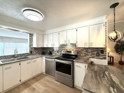 Photo 3 of 52 of home located at 1071 Donegan Rd Lot 259 Largo, FL 33771